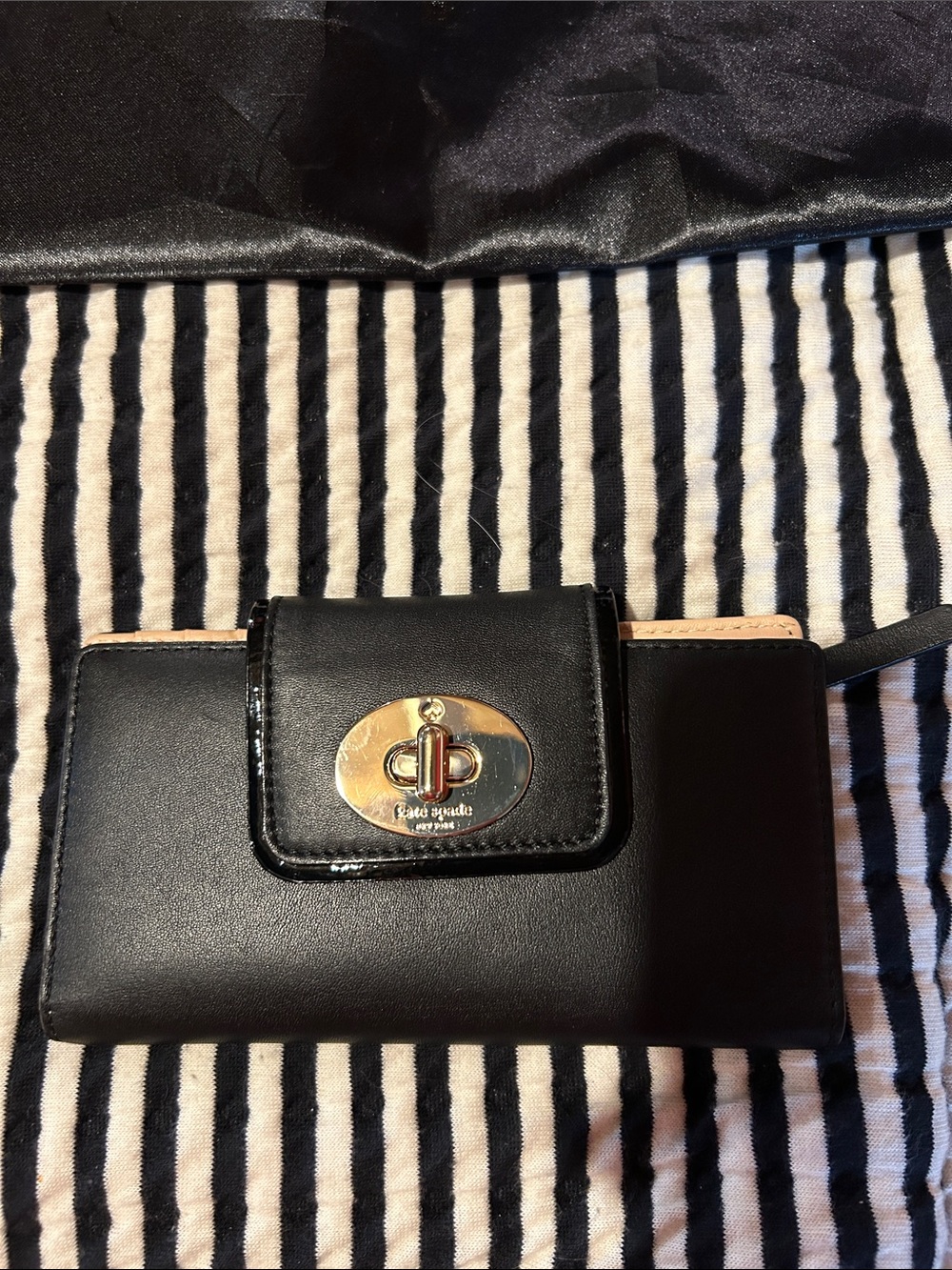 kate spade Black Leather Wristlet Phone Case with Gold Turnlock